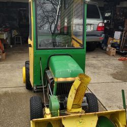 214 John Deer Tractor With Cab 