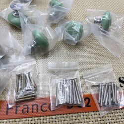 Knobs Stainless steel with the golden circle. Quantity 10 with hardware. New never used