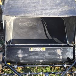 Lawn Sweeper with Raking Tines