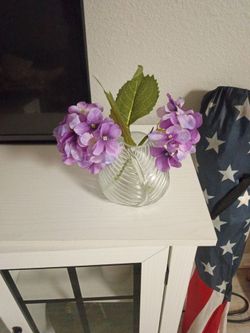 Display case and flowers