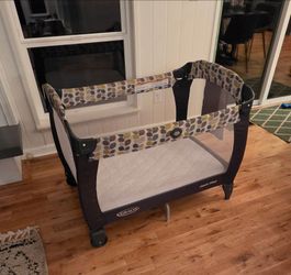 Graco Pack ’n Play with 3" memory foam mattress and carry bag — $55