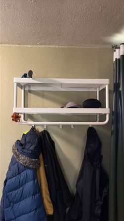 Coat hanger with shelving
