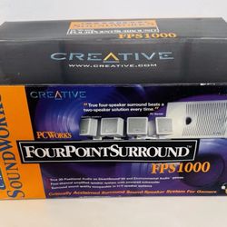 Found FourPointSurround FPS1000 4.1 surround speakers in garage sale.