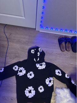 Denim Tears black hoodie with white flowers. Size M