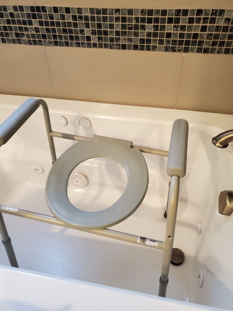 Handicap toilet seat with handles