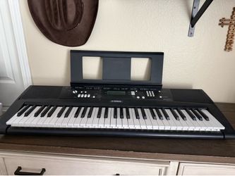 Yamaha EZ 220 keyboard piano