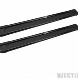 Extruded aluminum. Slip resistant rubber step area. Molded end caps add unique style. Cradle mounted boards. 

