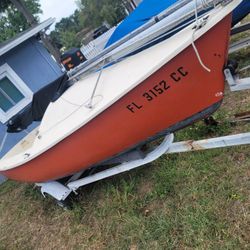 16ft Sunbird Sail boat With  23ft Mast And Has Trailer 