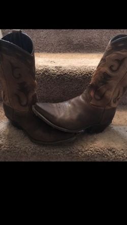 Brown leather cowboy boots