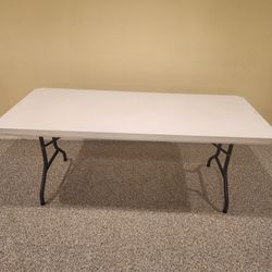Used Lifetime Folding Table And 4 Chairs