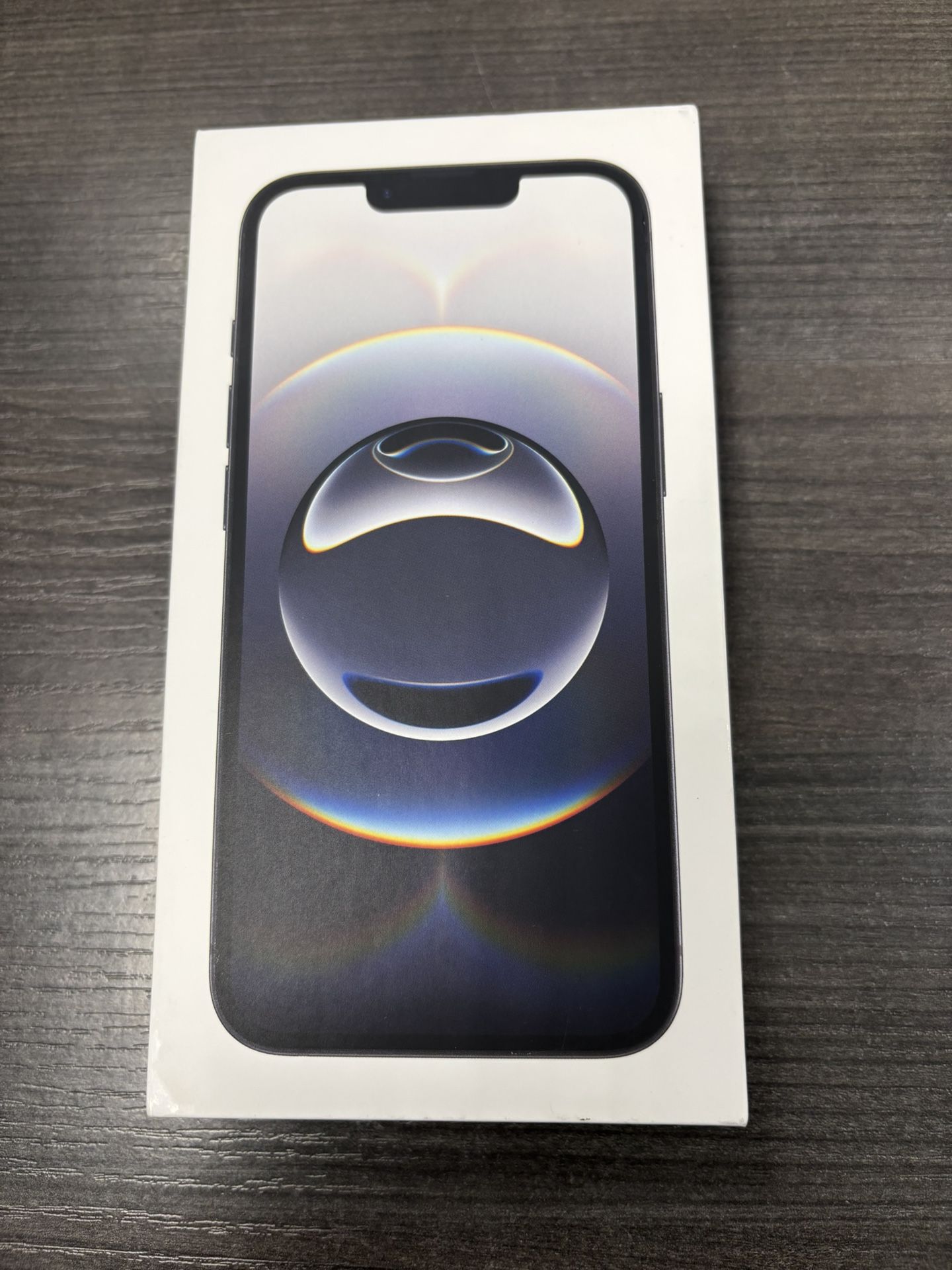New in sealed box IPhone 16e for use with T-Mobile until July 2027