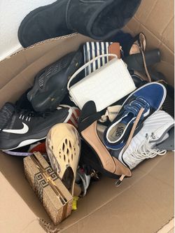 Box of name brand shoes