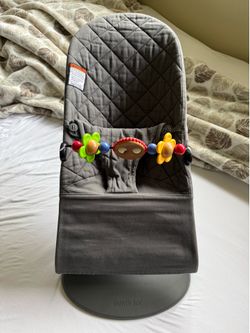 BabyBjörn Bouncer Bliss in Anthracite Cotton with Toy Bar Accessory | Dark Gray Collapsible & Portable Bouncer with Activity Attachment | MSRP $295