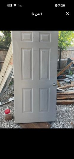 Wooden door clad in galvanized sheet metal; dimensions are shown in the image. No frame included.