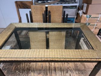 Pier one glass table and wicker chair set