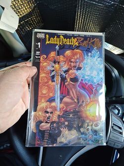 Looking to trade or sale my Lady Death Bad Kitty #1 Signed Comic Book