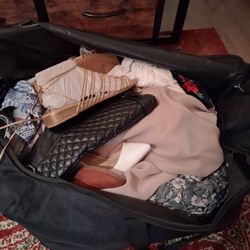 Giant, Demure, Classy Duffle Bag Of Women's Clothes.