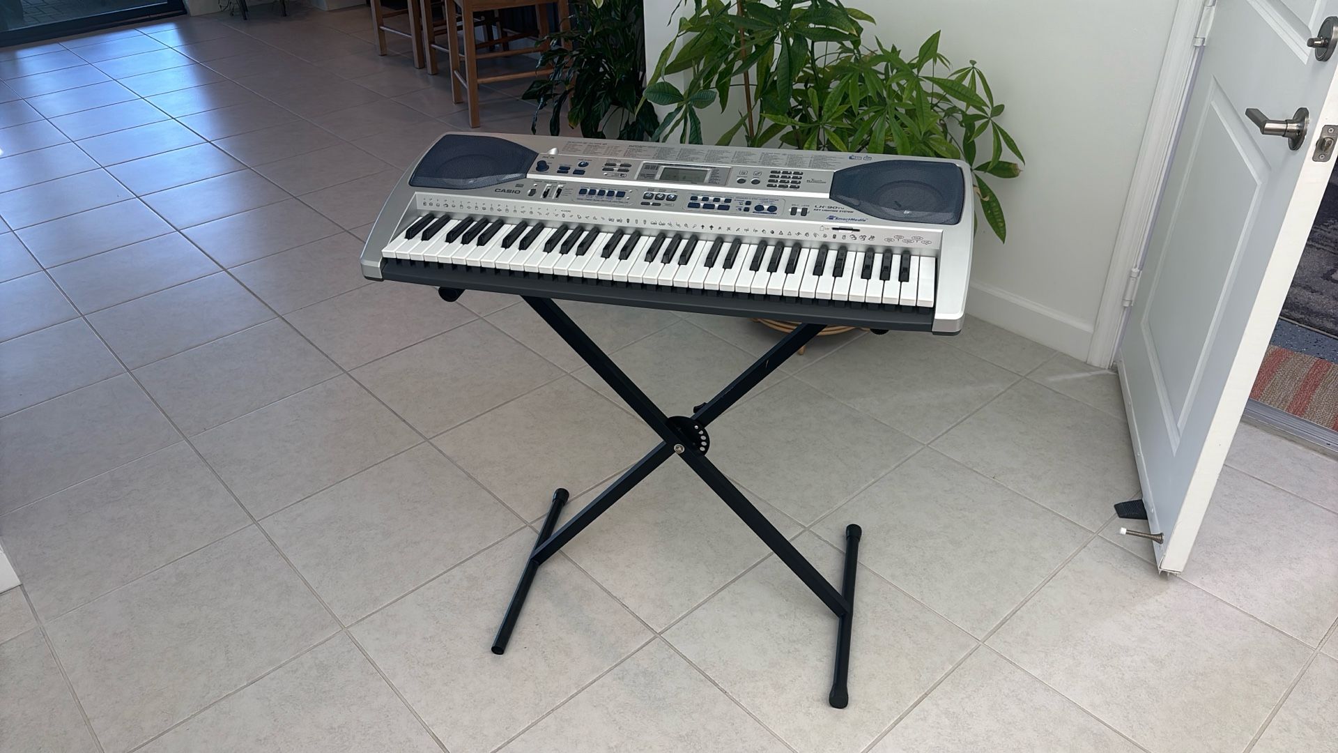 Casio keyboard, Used,  Stand /Power Cable . Works Perfect 