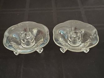 Pair of vintage Fenton clear glass three-footed candle holders.