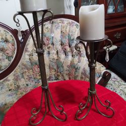 Beautiful heavy Wrought Iron Candle holders With 3 hanging Crystals  16 and 12 inches tall.