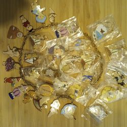 Vintage Kewpie Charm Necklace With 35 Enamel Gold Medal Charms 1.5"