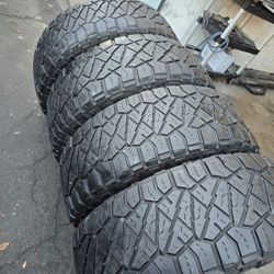 4 used tires Lt285 65r18 Nitto ridgerappler (LT,E) , 10 PLY, $290.00