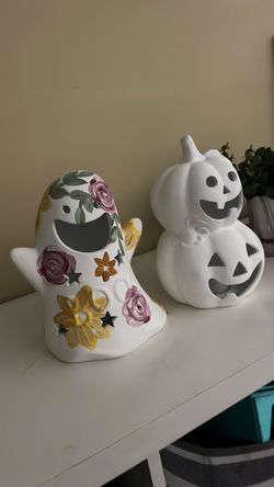 Two Halloween ceramic figures come with lights up $7.00 each or $10 for both