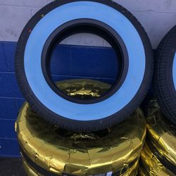 WIDE WHITE WALL TIRES FROM. 195/75/14.