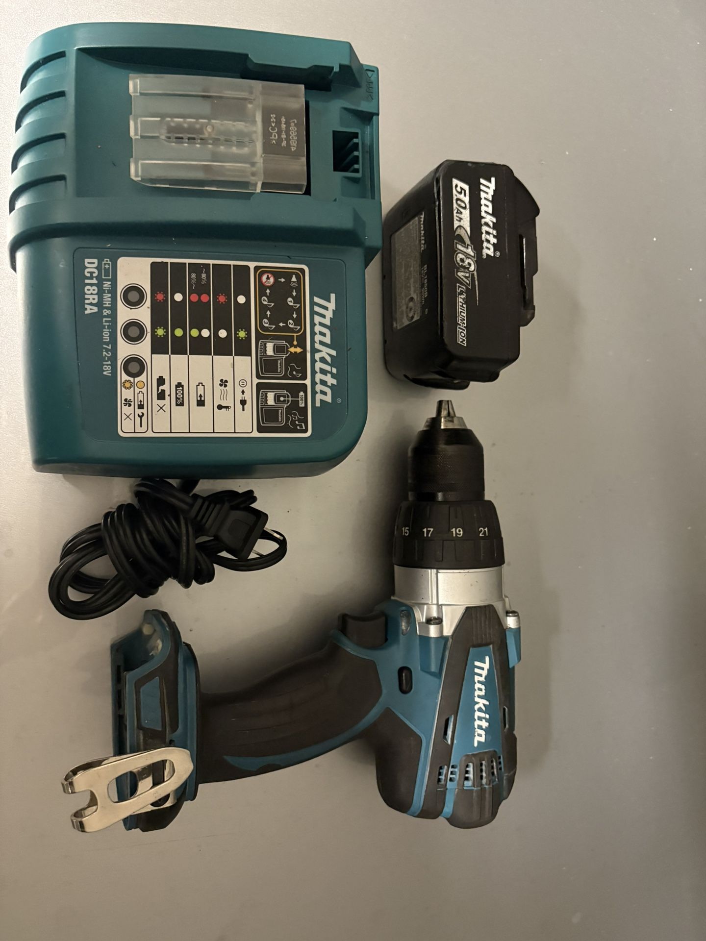 MAKITA XPH03 Hammer Drill, Charger and 18v 5 amp Battery 