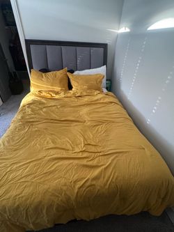 Queen sized bed set, treadmill, entertainment center and more