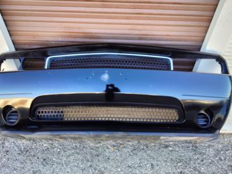 2011-2014 Dodge Challenger complete front bumper with Grill OEM.