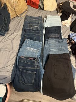 Eight Pairs  A Size 16 Women’s Jeans