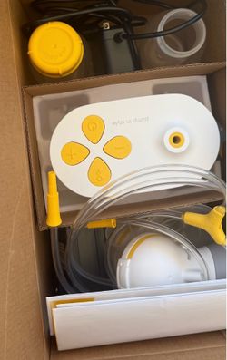 New Medela pump and style  double electric sell or trade for Enfamil 12oz cans