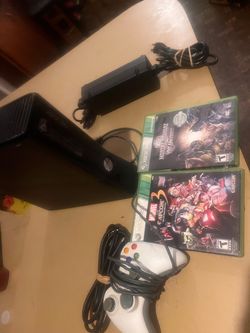 Xbox 360 slim 4 gig w control and games