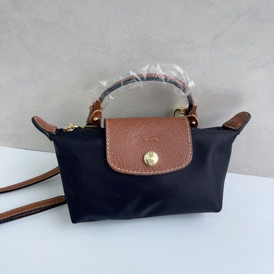 Longchamp pink with punch-free shoulder strap Mini dumpling bag
