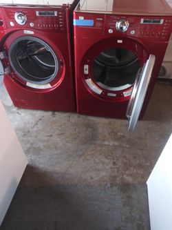 LG front load washer and electric dryer set working perfectly with 4 months warranty