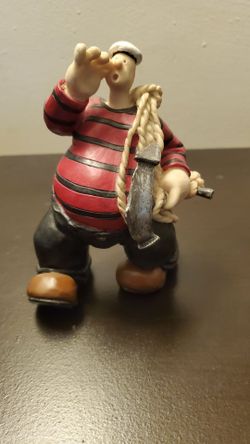 Sailor wearing red and black striped clothing.