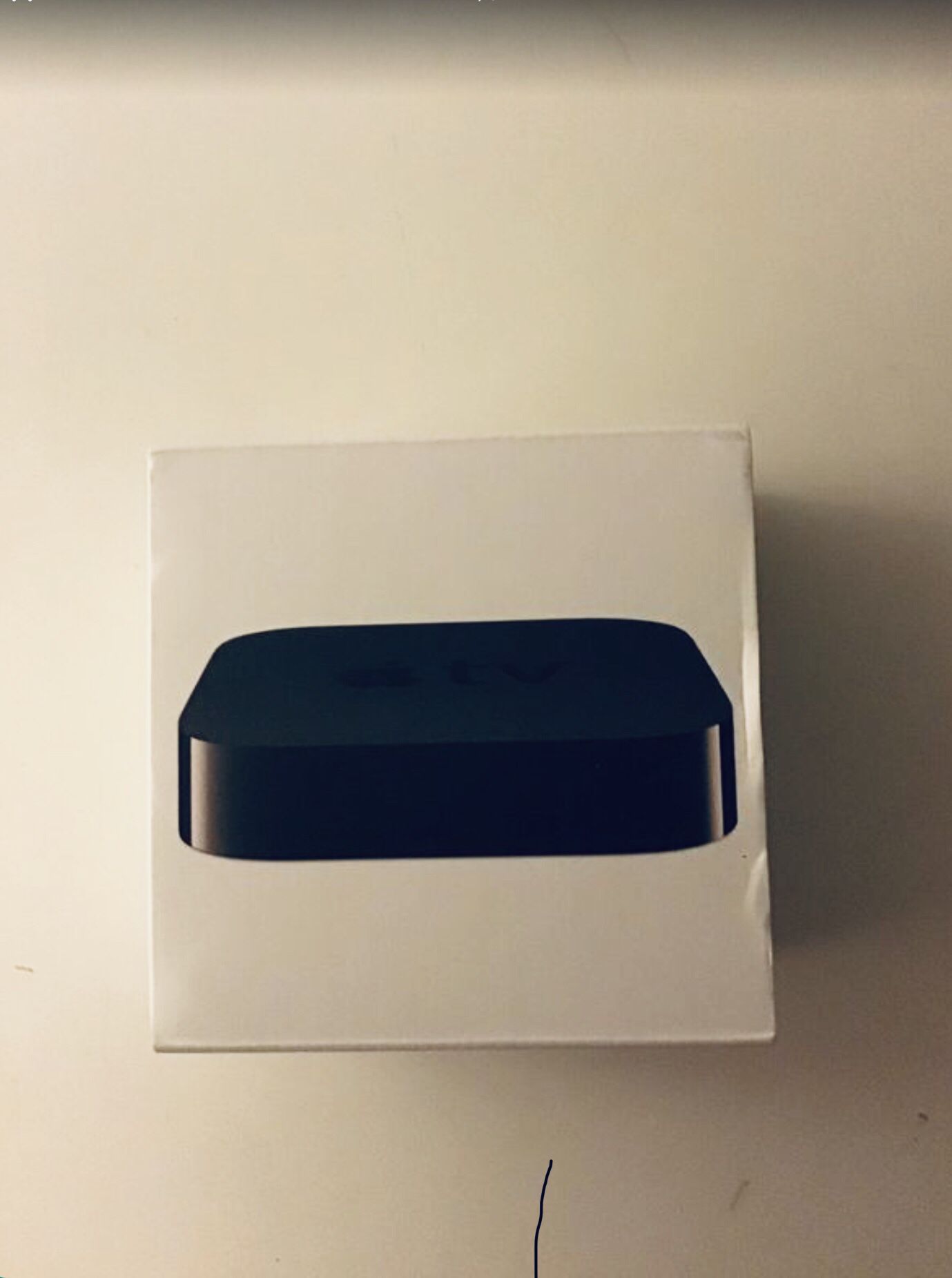 Apple TV with box and remote