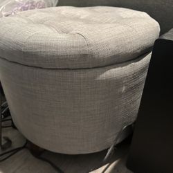 Grey ottoman with storage