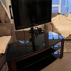 TV Center Stand + TV Included