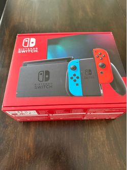 Brand New Nintendo Switch with Neon Blue and Neon Red Joy-Con