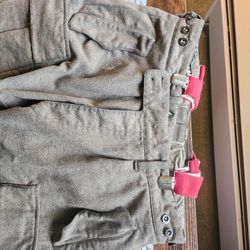 Army wool pants and a pair of leather leiderhosen
