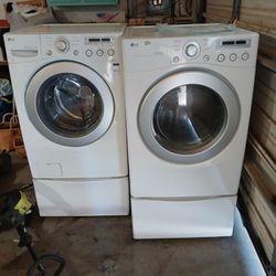 LG Washer And Dryer On Pedestals 