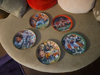 Joe Namath , Dan Marino, Montana, Favre and Elway plates