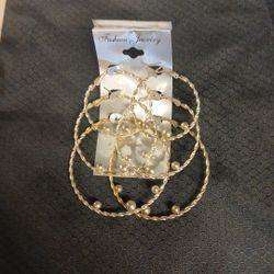 3 Different Size Pairs Of Gold Hoop Earrings With White Pearls