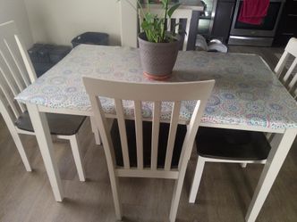 Sofa and  wooden dining table with 4 chairs