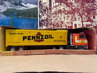 1980’s Ertl Metal Pennzoil Tractor Trailer. New Unopened. 20” Long.
