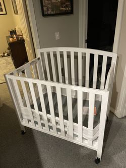 Crib With Double Padded Mattress