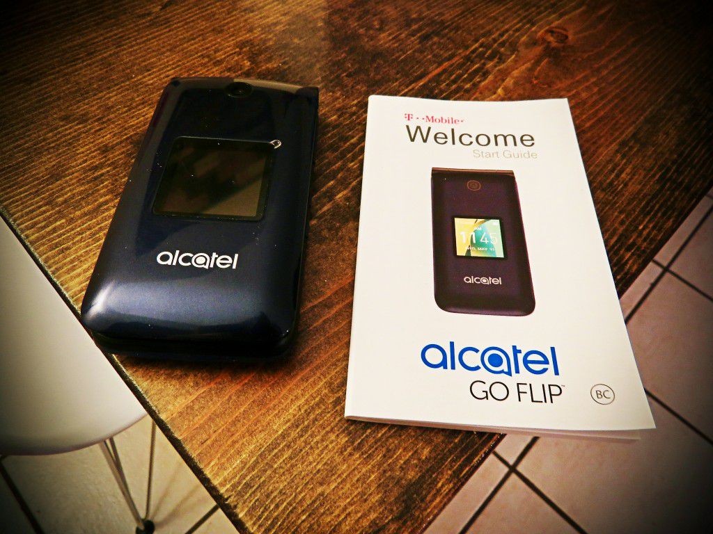 Alcatel Go Flip From T-Mobile/Sprint. Comes with charger, manual and box.