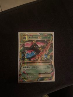 MVenusaurEX Pokémon Card in Great condition! And comes with 10 energy cards from 2020